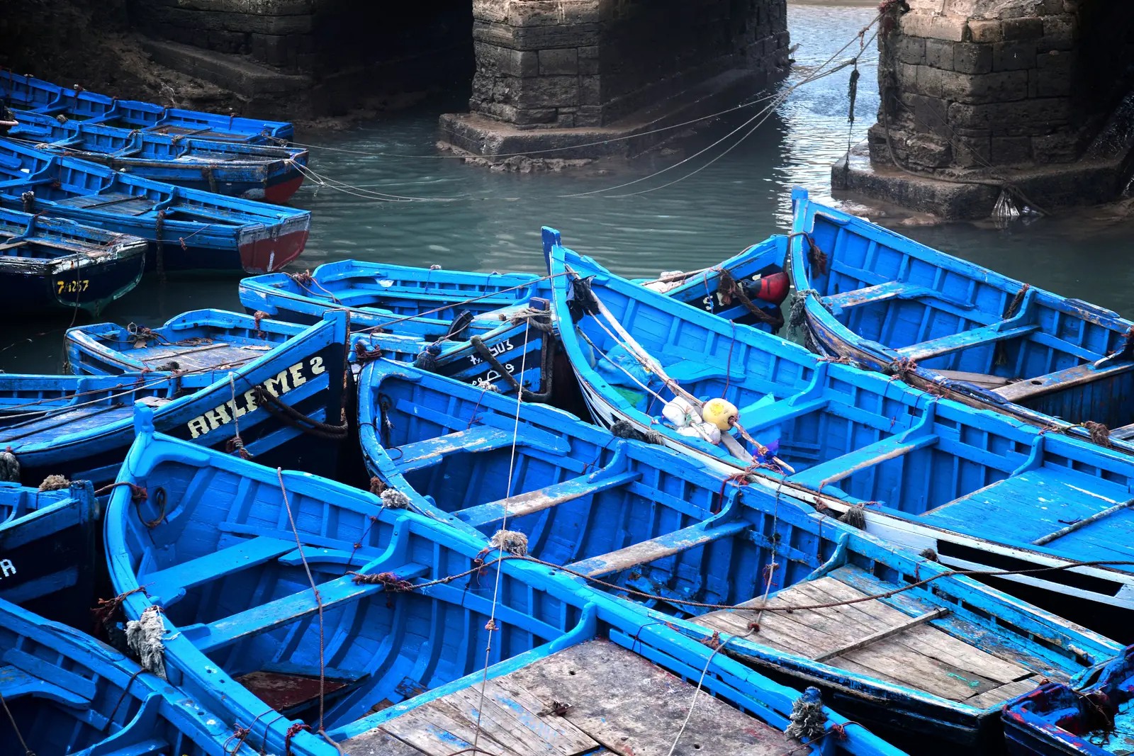 Blue fishing boats in the port of Essaouira