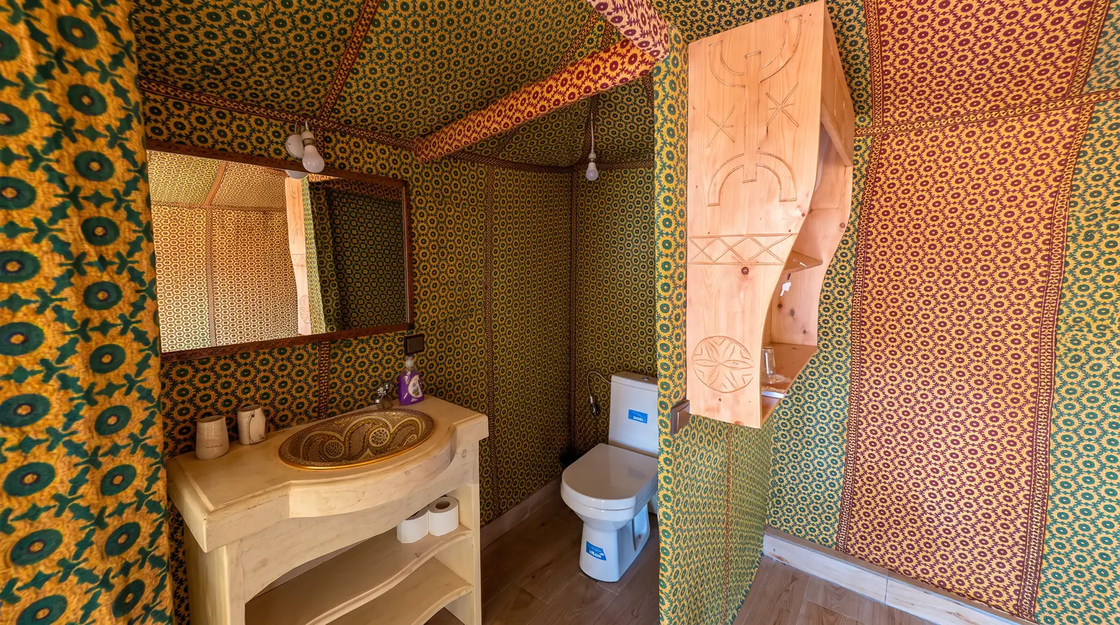 The private bathroom inside a tent at Merzouga Dunes Luxury Camps